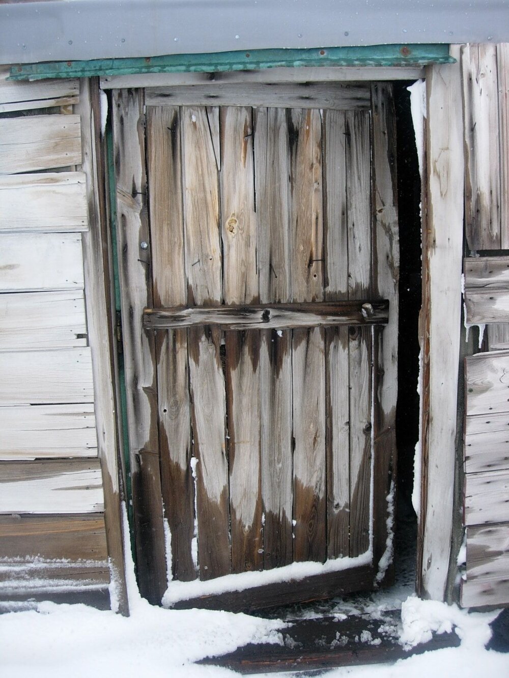 Snow Build-up and ice ingress on stable door, Scott's 'Terra Nova' hut