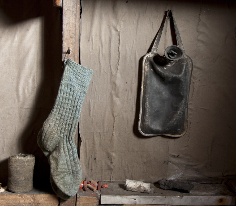 Socks and hot water bottle hanging in Scott's 'Terra Nova' hut
