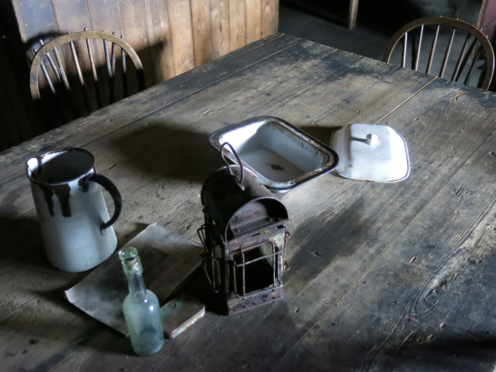 2014-15 Scott's 'Terra Nova' hut, interior, Wardroom table artefacts