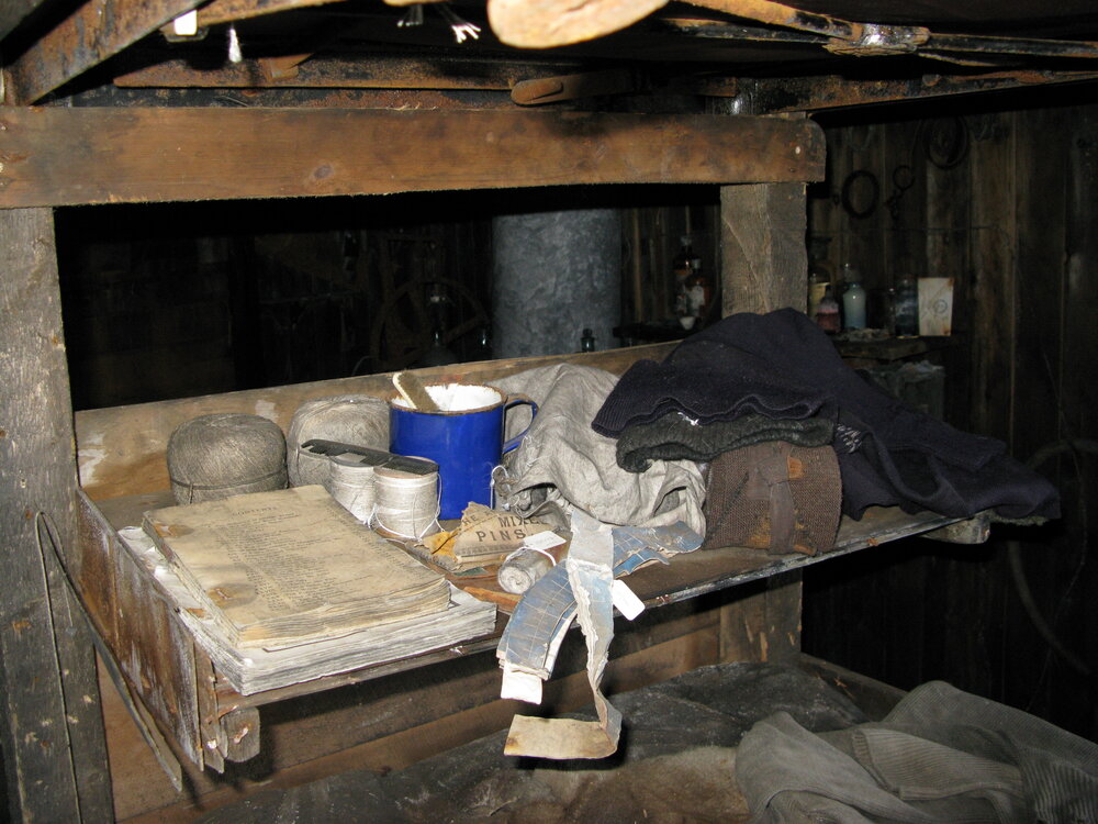 2010-11 Artefacts on Simpson's bunk inside Scott's 'Terra Nova' hut (001)