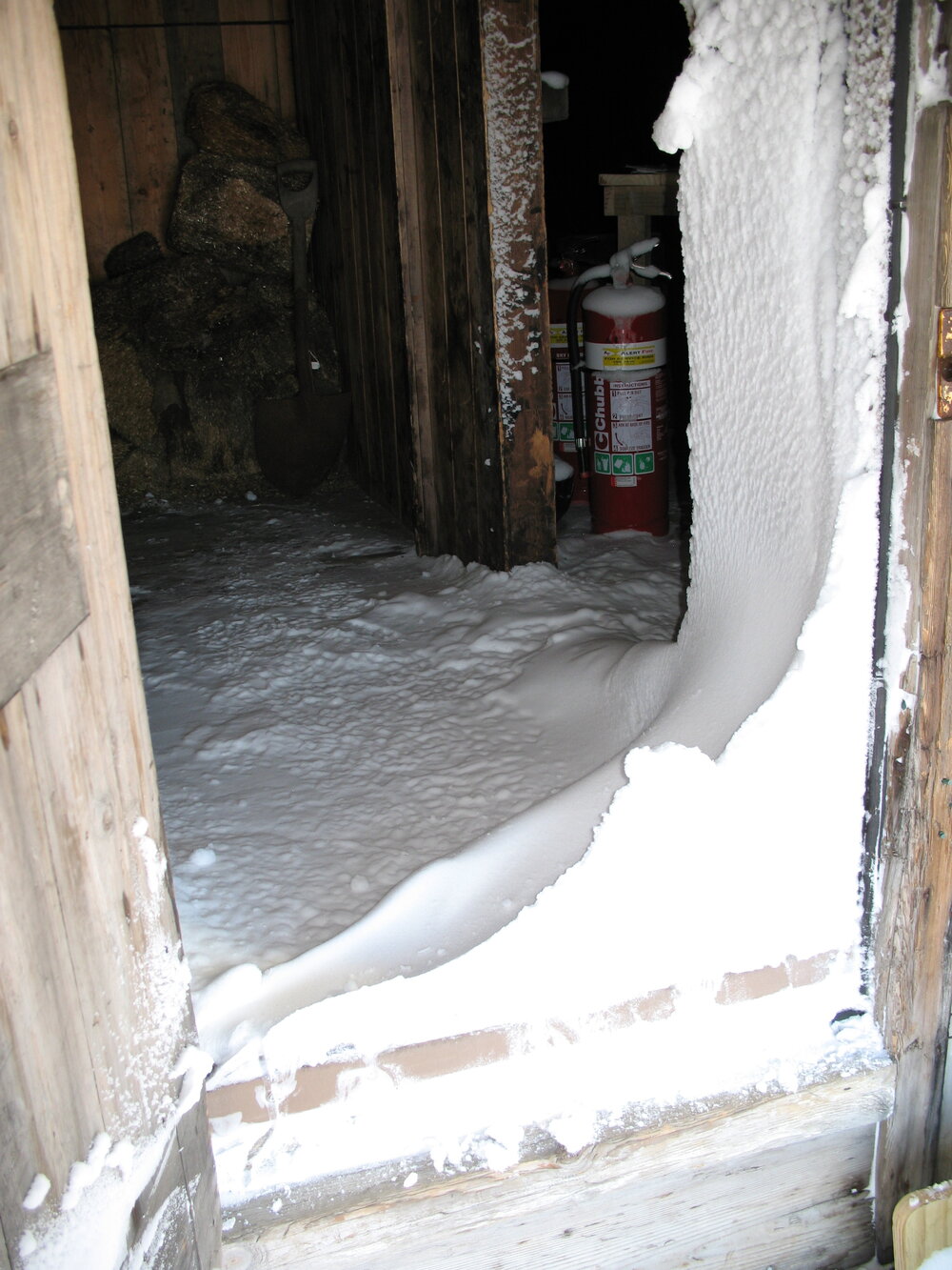 2007 Scott's 'Discovery' hut inspection, exterior, snow build-up, main door