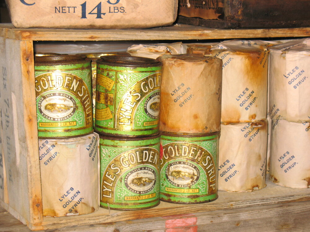 2013-14 Tins of Lyle's golden syrup inside Scott's 'Terra Nova' hut, Cape Evans
