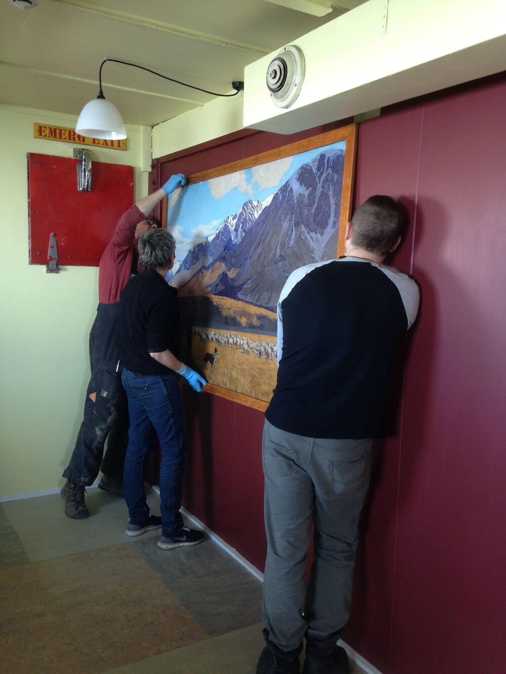 Re-hanging Marcus King oil painting, Hillary's TAE/IGY Hut (002)