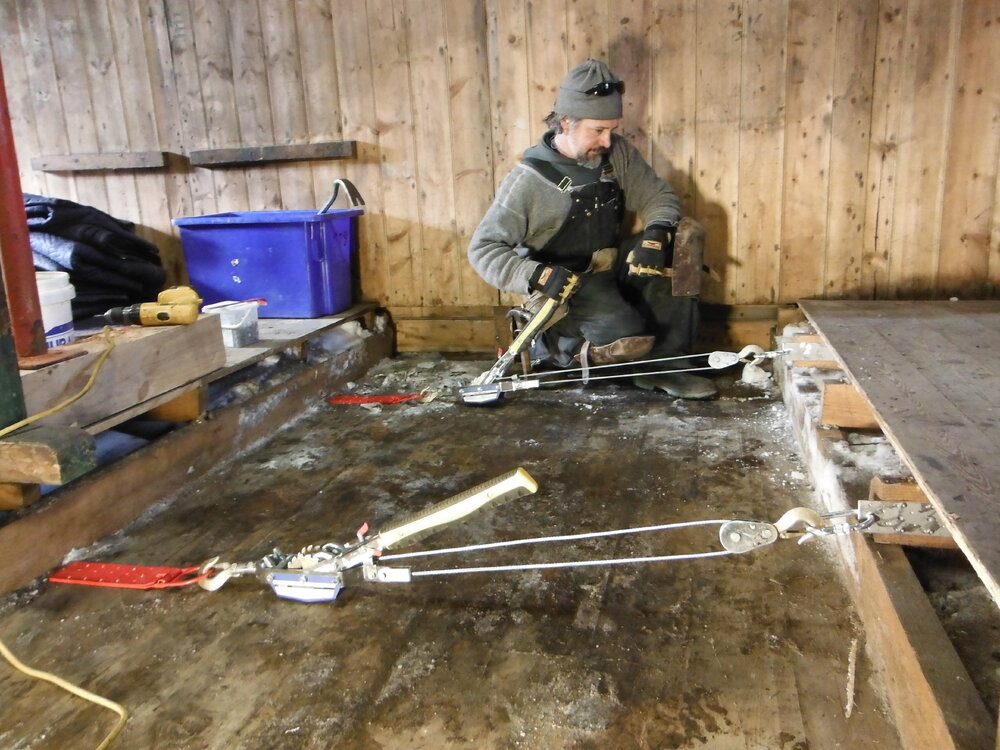 2013-14 Gord Macdonald working inside Scott's 'Discovery' hut, Hut Point 