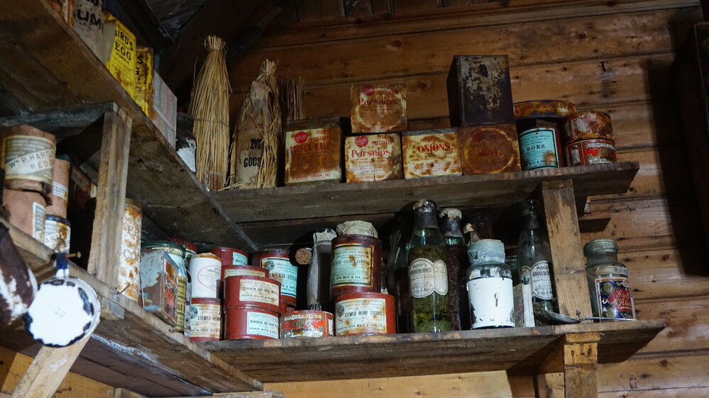 2022-23 Provisions on shelves inside Shackleton's 'Nimrod' hut