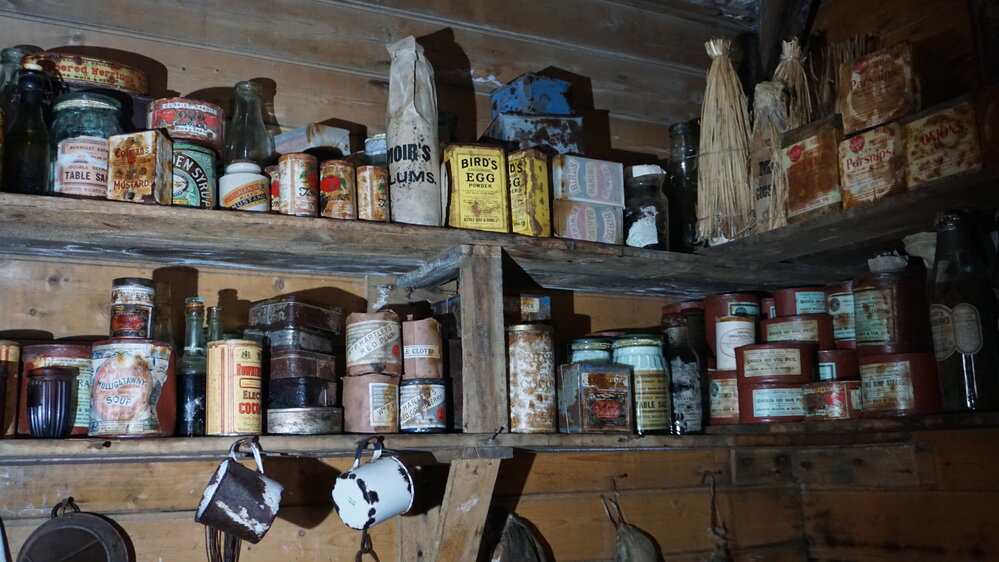 2022-23 Provisions on shelves inside Shackleton's 'Nimrod' hut