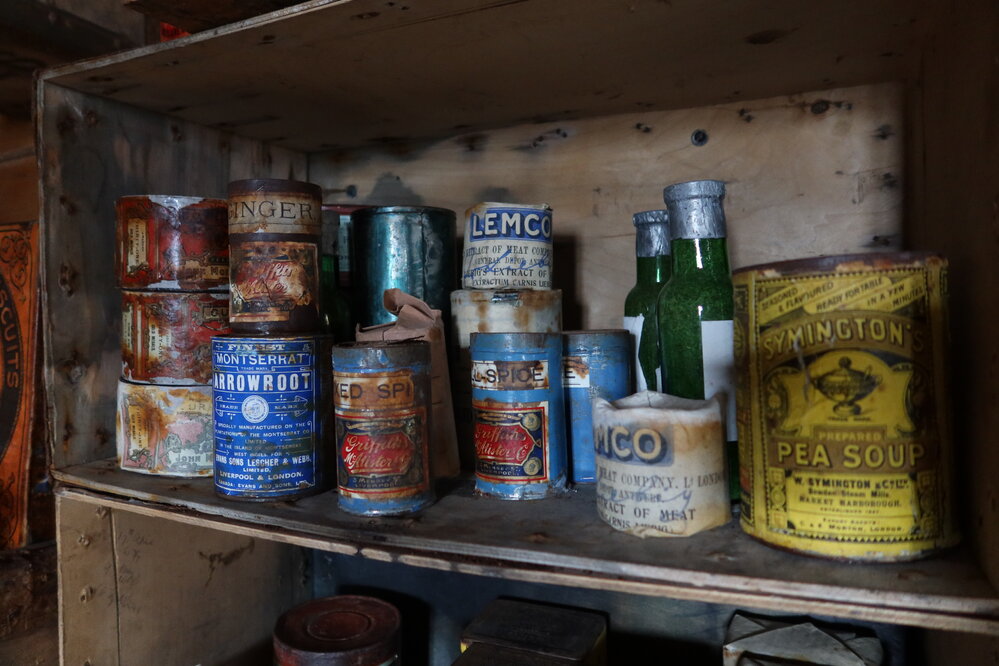2022-23 Provisions on shelves inside Shackleton's 'Nimrod' hut