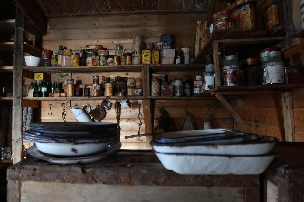 2022-23 Provisions on shelves inside Shackleton's 'Nimrod' hut