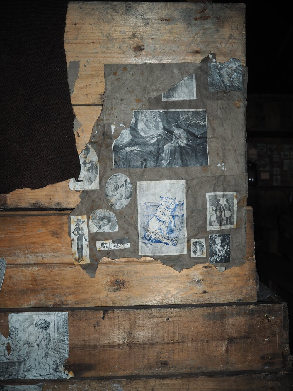 Pictures decorating bunk, Scott's 'Terra Nova' hut