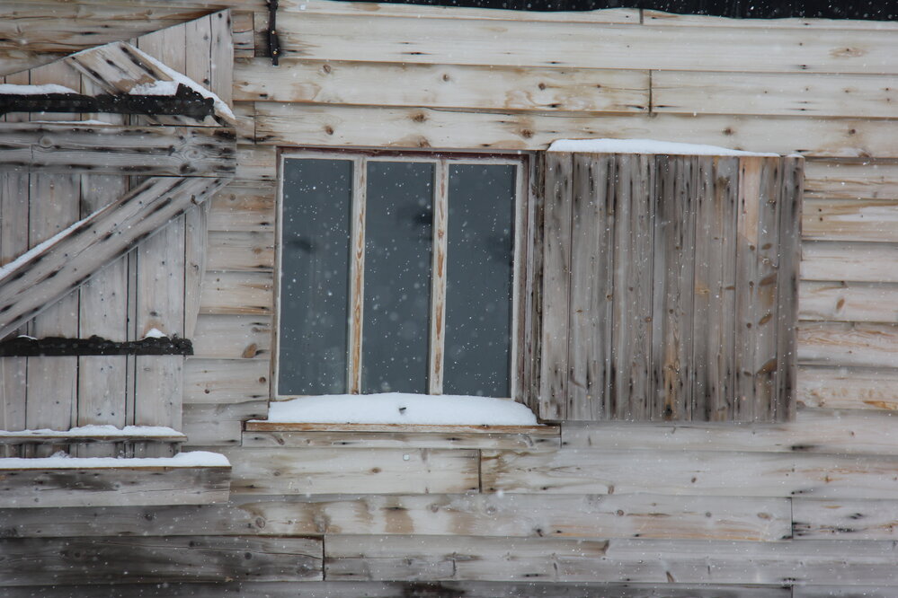 2022 Scott's 'Terra Nova' hut, exterior detail, South elevation window during snowfall