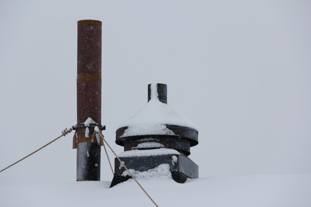 2002 Scott's 'Terra Nova' hut, exterior detail, flue and ventilator during snowfall