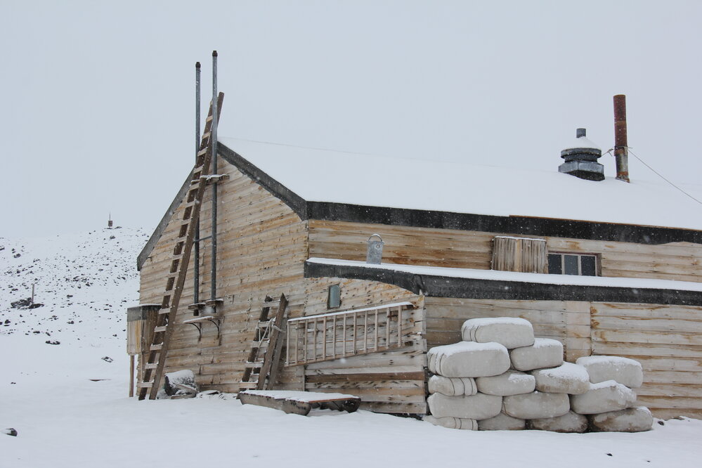 2022 Scott's 'Terra Nova' hut, exterior, North-east corner during snowfall (001)