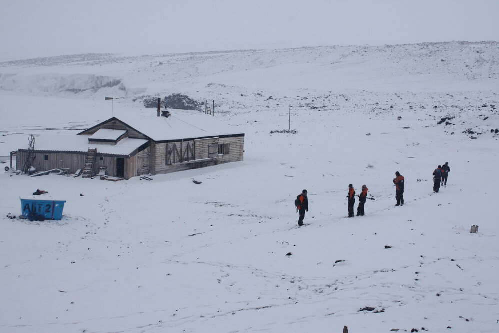 2022 Scott's 'Terra Nova' hut, environs, and AHT staff during snowfall (001)