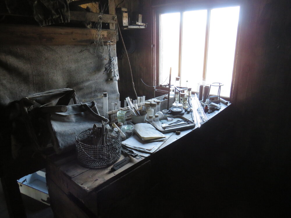 2022 Scott's 'Terra Nova' hut, interior, scientific equipment on work bench, Biology area