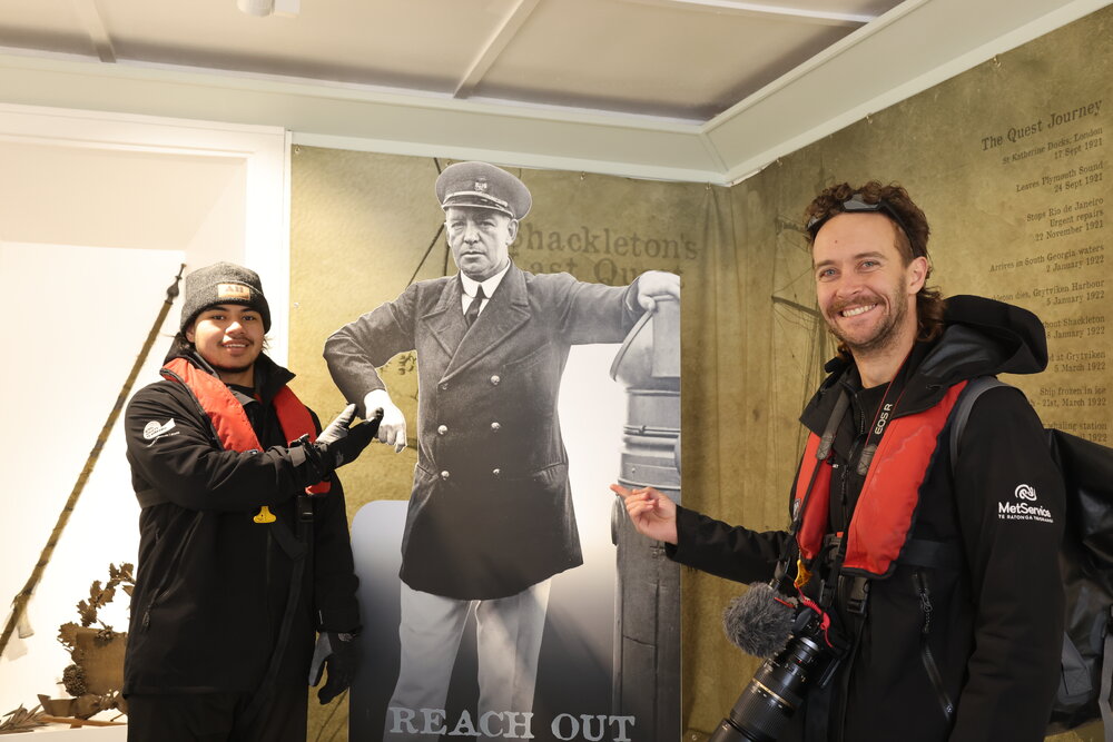 Rykien Amiatu and Cole Yeoman standing with Shackleton