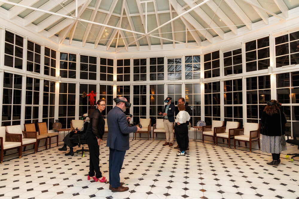 Guests trying the VR experience at the launch of the Scott's 'Discovery' hut Virtual Reality Experience