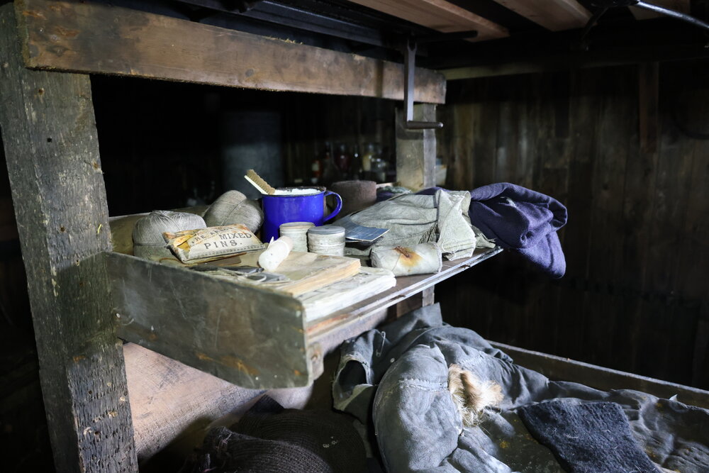 2025 Shelf on Simpson's bunk, Scott's 'Terra Nova' Hut