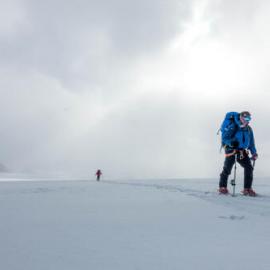 Antarctic Heritage Trust Executive Director Nigel Watson and another expedition member on skis during the crossing of South Georgia