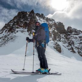 Inspiring Explorer Sinéad Hunt arriving on skis at the top of a pass in South Georgia