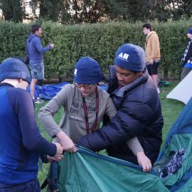 Three Young Inspiring Explorers pitching their tent for an overnight stay (002)