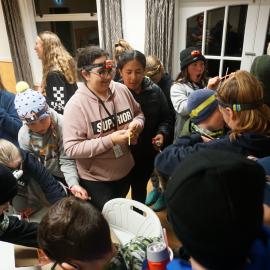 Young Inspiring Explorers prepare for evening activities