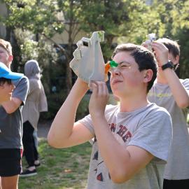 Young Inspiring Explorer Archie uses a sextant