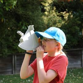 Young Inspiring Explorer Catherine uses a sextant