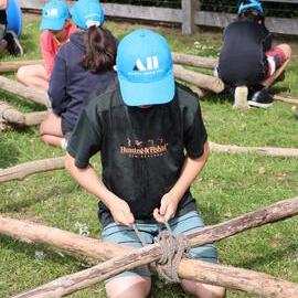 Young Inspiring Explorer Archie building a raft