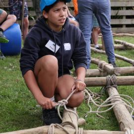 Young Inspiring Explorer Freya building a raft on the Worsley Weekend