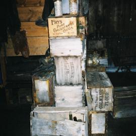 2002 Scott's 'Terra Nova' hut, interior - Galley bulkhead stores boxes (001)