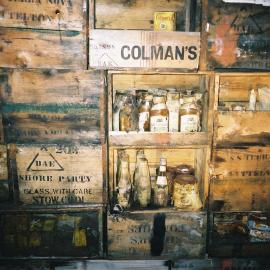 2002 Scott's 'Terra Nova' hut, interior - Galley bulkhead stores boxes (002)