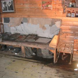 2003-04 Bunk and footwear along south wall in Shackleton's 'Nimrod' Hut