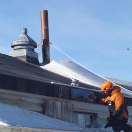 Painting the roof of Scott's 'Terra Nova' hut (004)