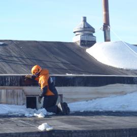 Painting the roof of Scott's 'Terra Nova' hut (007)