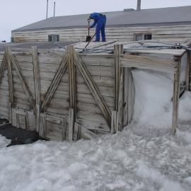 Snow and ice removal from Scott's 'Terra Nova' Hut 