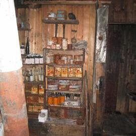 2003-04 Food supplies against west wall of Galley, Scott's 'Terra Nova' Hut