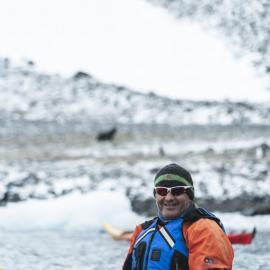 AHT Executive Director Nigel Watson in kayak on Antarctic Peninsula
