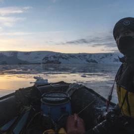 Alexander Hillary aboard zodiac on Antarctic Peninsula morning