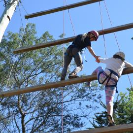 Young Inspiring Explorers Emily and Erin on the high ropes (006)