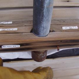 Supporting bracket for pipe on east elevation