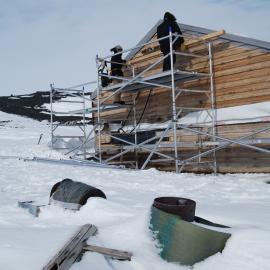 Heritage Carpenters re-installing cladding, east elevation