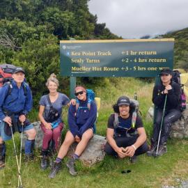 Group photo at Department of Conservation sign (001)