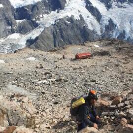 Inspiring Explorers alumni A'aifou Potemani tackling the rocky slope