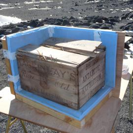 2009-10 Mackinlay's whisky crate in packing box, Shackleton's 'Nimrod' hut, Cape Royds