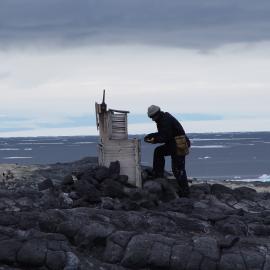 2006-07 Charley Brentnall with the Meteorological screen at Cape Royds