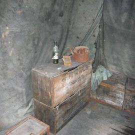 2008 Artefacts on stacked dog biscuit boxes inside Scott's 'Discovery' hut