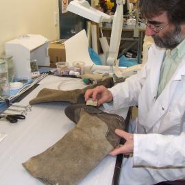 2007 Conservator Chris Calnan treating a boot