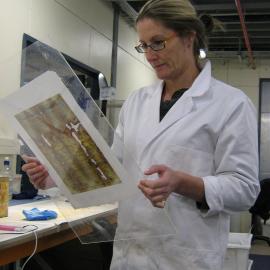 2007 Conservator Philippa Durkin with a treated artefact