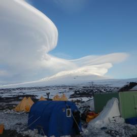 Lenticular clouds, camp and Mount Erebus