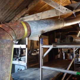 Flue installation in Scott's 'Terra Nova' Hut